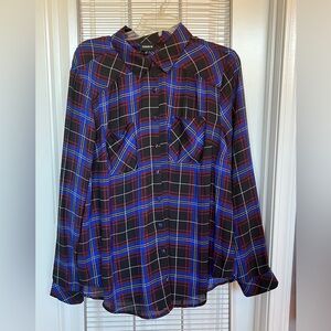Sheer, long sleeve, plaid button up blouse.
